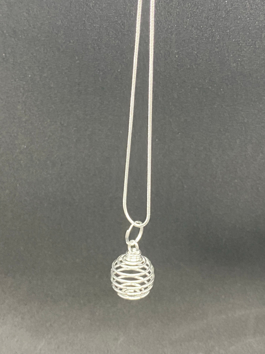 Silver Cage and Necklace